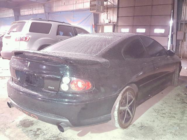 6G2VX12U66L828303 - 2006 PONTIAC GTO BLACK photo 4