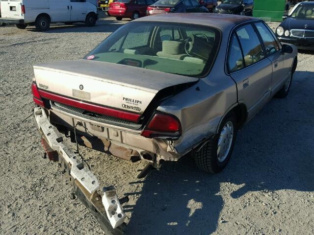 1G3HN52K3W4858371 - 1998 OLDSMOBILE 88 BASE TAN photo 4