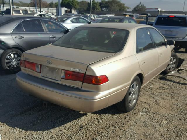 JT2BG22K910566814 - 2001 TOYOTA CAMRY CE GOLD photo 4