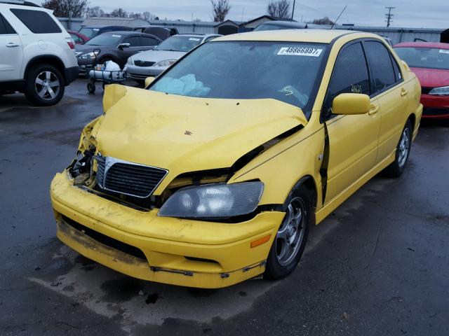 JA3AJ86E82U066051 - 2002 MITSUBISHI LANCER OZ YELLOW photo 2