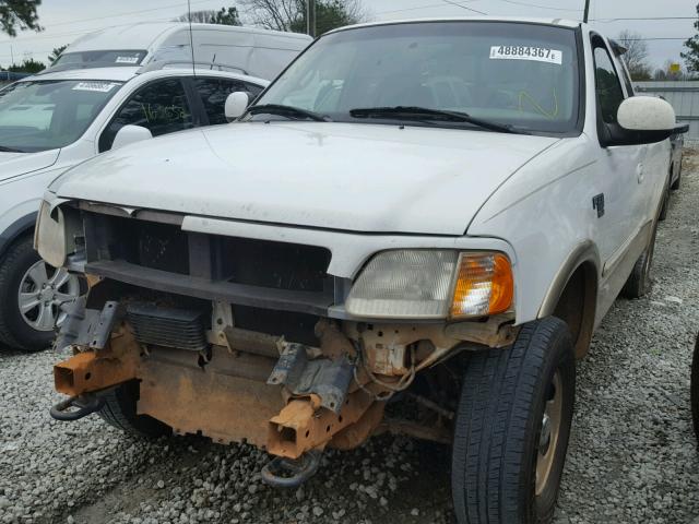 1FTRX18L1XNB69416 - 1999 FORD F150 WHITE photo 9