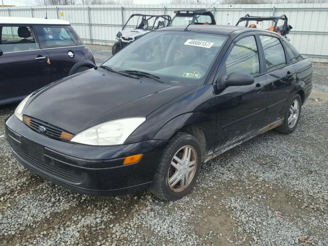 1FAFP3439YW343710 - 2000 FORD FOCUS SE BLACK photo 2