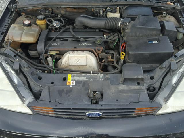 1FAFP3439YW343710 - 2000 FORD FOCUS SE BLACK photo 7