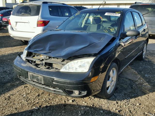 1FAHP37N17W151282 - 2007 FORD FOCUS ZX5 BLACK photo 2