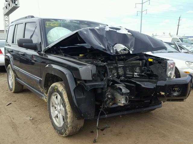 1J8HG48K57C669233 - 2007 JEEP COMMANDER BLACK photo 1