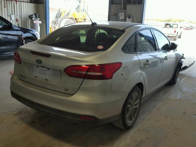 1FADP3F26HL313528 - 2017 FORD FOCUS SE SILVER photo 4