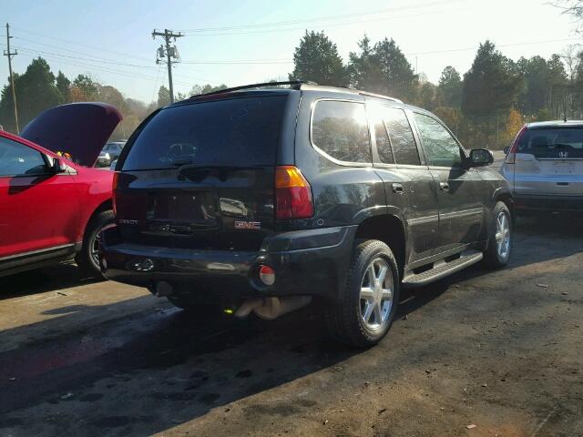 1GKDS13S082163766 - 2008 GMC ENVOY BLACK photo 4