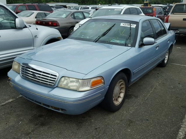 2FAFP74WXYX159253 - 2000 FORD CROWN VICT BLUE photo 2