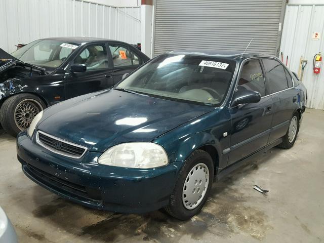 JHMEJ6579VS015327 - 1997 HONDA CIVIC LX GREEN photo 2