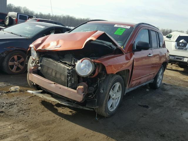 1J4FT47A09D228457 - 2009 JEEP COMPASS SP ORANGE photo 2