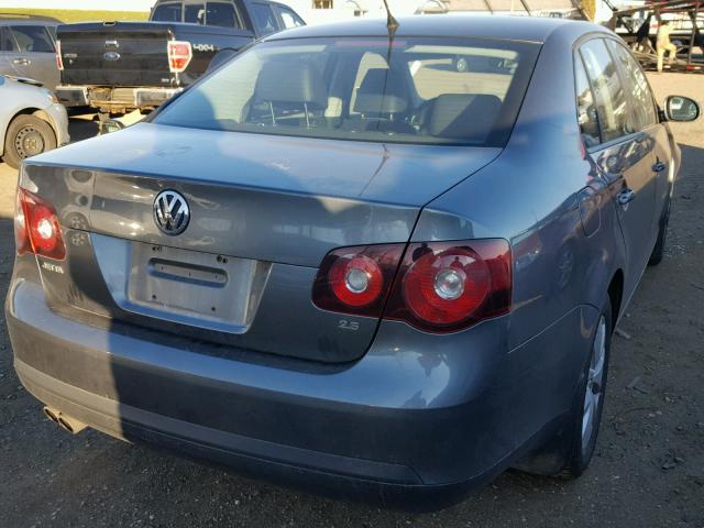 3VWAZ7AJ7AM093105 - 2010 VOLKSWAGEN JETTA LIMI BLUE photo 4