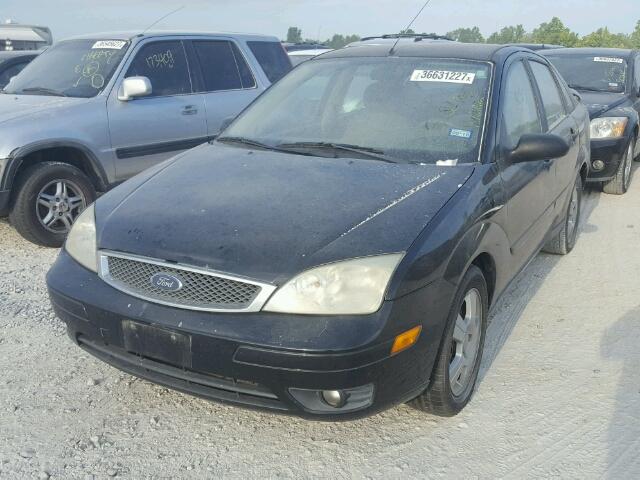 1FAFP34N65W207189 - 2005 FORD FOCUS ZX4 BLACK photo 2