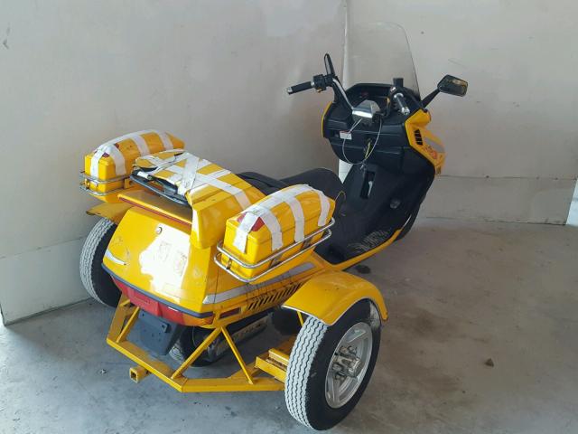 LCETDNP1196300430 - 2009 CFHG SCOOTER YELLOW photo 4