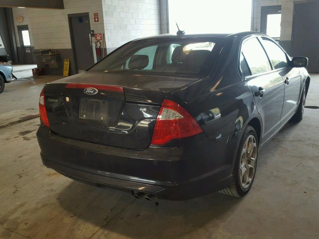 3FAHP0HA7BR123217 - 2011 FORD FUSION SE BLACK photo 4