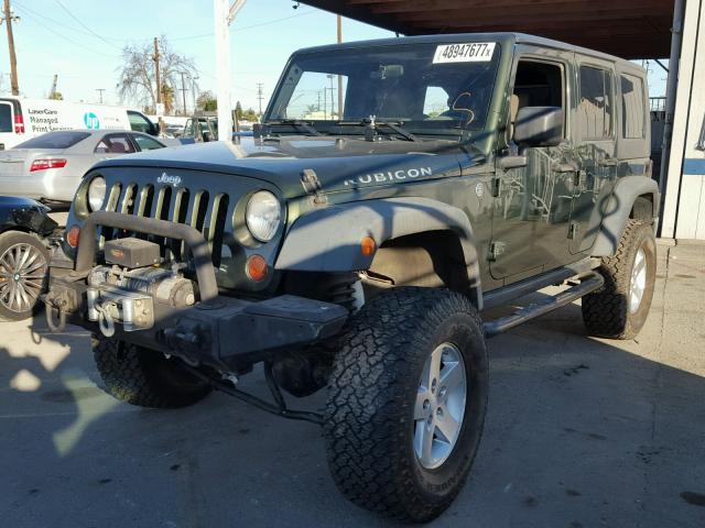 1J4GA69159L703321 - 2009 JEEP WRANGLER U GREEN photo 2