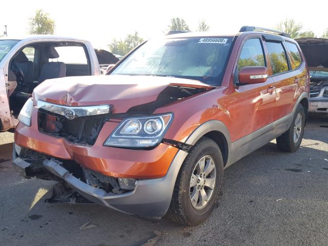 KNDJH741595019488 - 2009 KIA BORREGO LX ORANGE photo 2