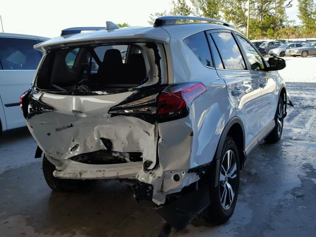 JTMWFREV4HD104979 - 2017 TOYOTA RAV4 XLE WHITE photo 4