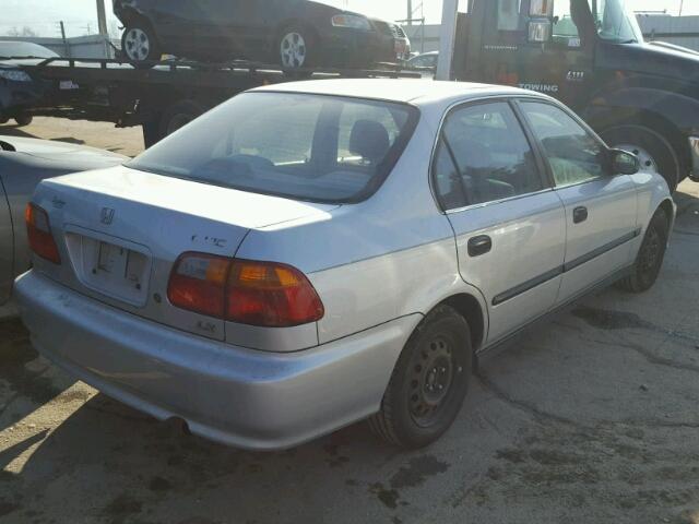 1HGEJ6674XL050095 - 1999 HONDA CIVIC LX SILVER photo 4