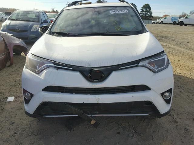 JTMRJREV9HD135656 - 2017 TOYOTA RAV4 HV LE WHITE photo 7