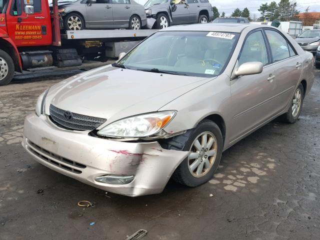 4T1BF30K13U556479 - 2003 TOYOTA CAMRY LE GOLD photo 2