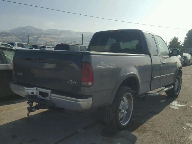 1FTRX18L72KC65707 - 2002 FORD F150 BLACK photo 4