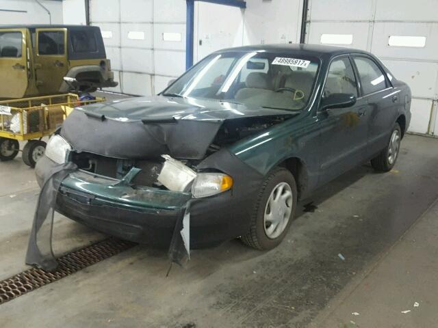 1YVGF22C5X5847622 - 1999 MAZDA 626 ES GREEN photo 2