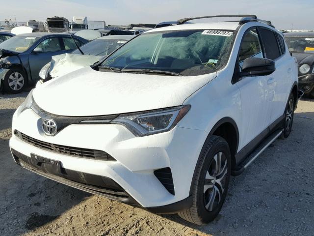 2T3ZFREV4GW235747 - 2016 TOYOTA RAV4 LE WHITE photo 2