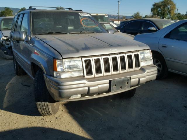 1J4GZ78Y8VC630128 - 1997 JEEP GRAND CHER TAN photo 1