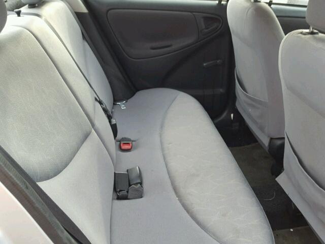 JTDBT123030284909 - 2003 TOYOTA ECHO SILVER photo 6