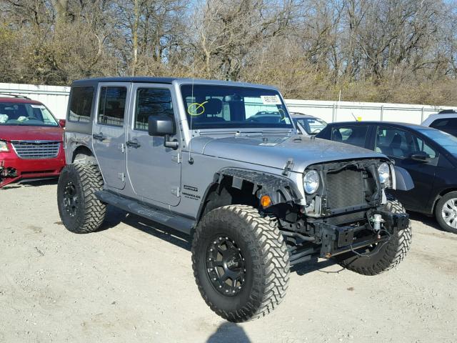 1C4BJWDG2GL211175 - 2016 JEEP WRANGLER U SILVER photo 1