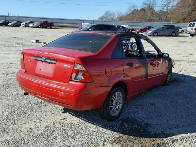 1FAFP34N15W229083 - 2005 FORD FOCUS ZX4 RED photo 4