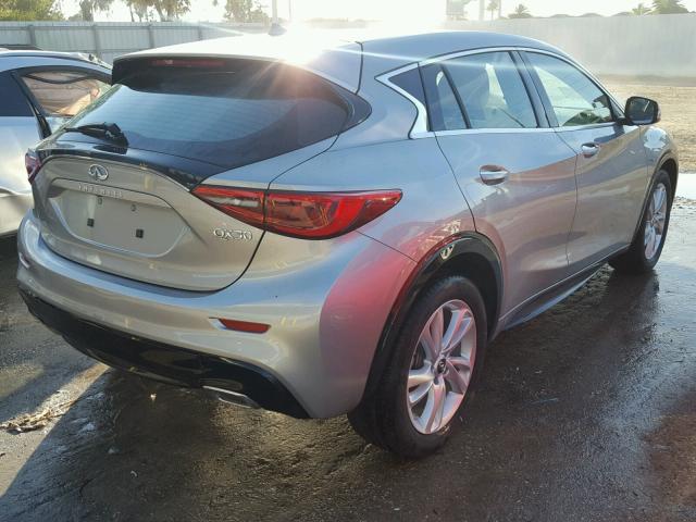 SJKCH5CPXJA046861 - 2018 INFINITI QX30 BASE GRAY photo 4