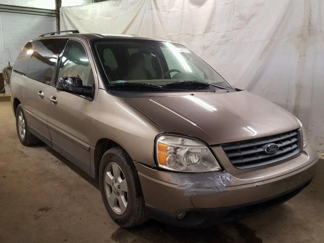 2FMZA57684BA08049 - 2004 FORD FREESTAR S GOLD photo 1