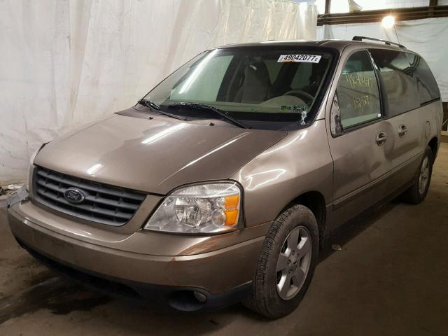 2FMZA57684BA08049 - 2004 FORD FREESTAR S GOLD photo 2