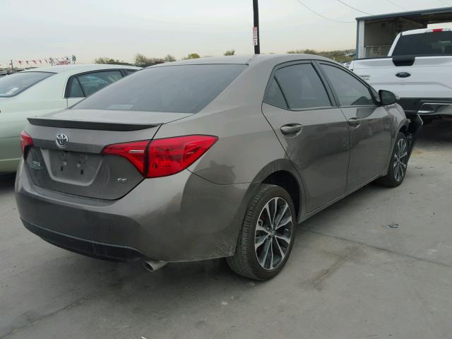 5YFBURHE6HP616319 - 2017 TOYOTA COROLLA L GOLD photo 4