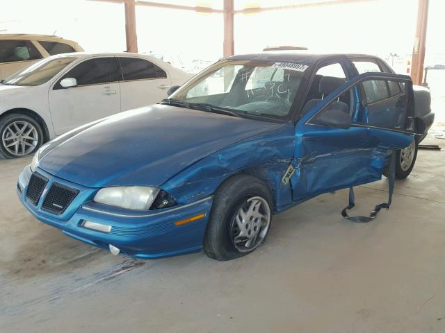 1G2NE55D9SM582096 - 1995 PONTIAC GRAND AM S 绿色 照片 2