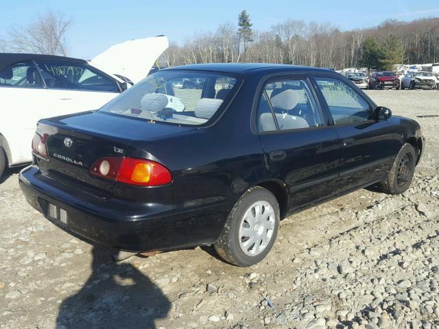 2T1BR12EX2C554930 - 2002 TOYOTA COROLLA CE BLACK photo 4