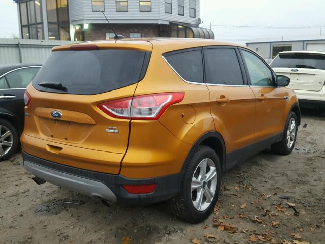 1FMCU9GX8GUC84145 - 2016 FORD ESCAPE SE ORANGE photo 4