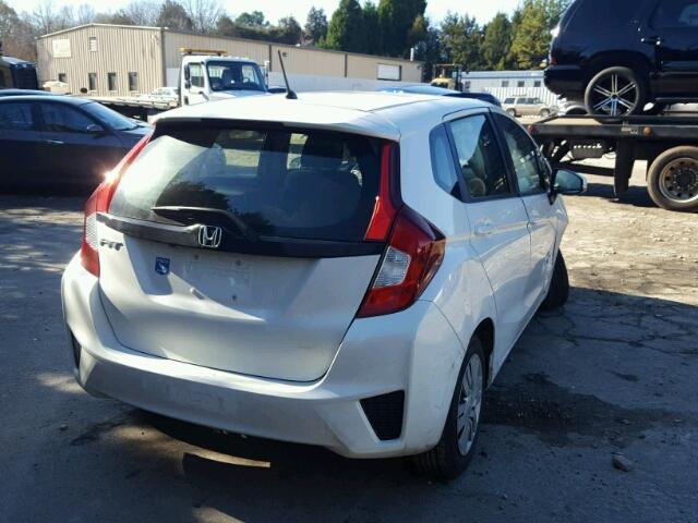 JHMGK5H53HS010865 - 2017 HONDA FIT LX WHITE photo 4