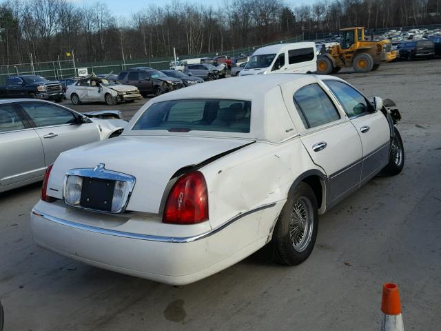 1LNHM82W6XY638736 - 1999 LINCOLN TOWN CAR S WHITE photo 4