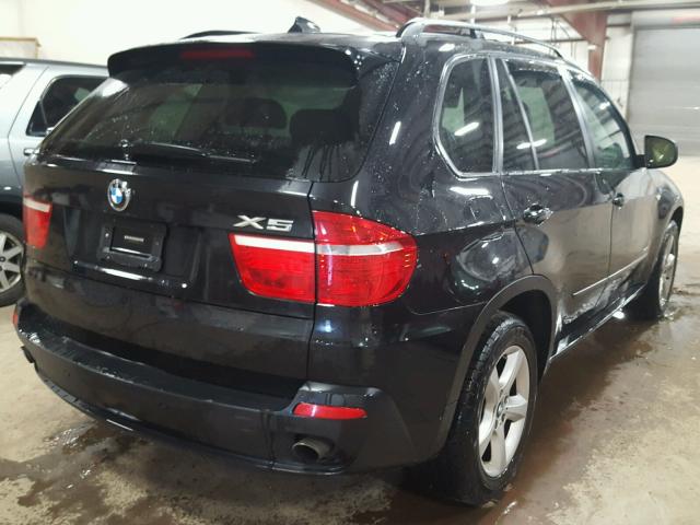 5UXFE4C53AL384624 - 2010 BMW X5 XDRIVE3 შავი ფოტო 4