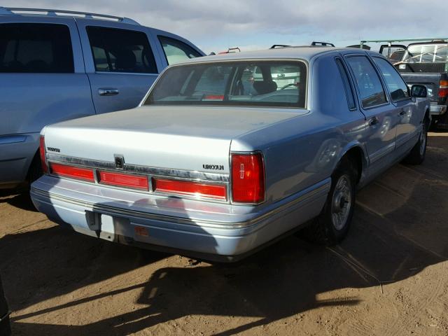 1LNLM81W3VY731934 - 1997 LINCOLN TOWN CAR E BLUE photo 4