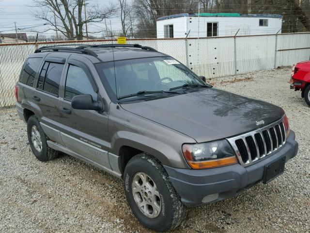 1J4GW58S0XC656301 - 1999 JEEP GRAND CHER GRAY photo 1