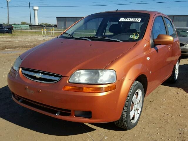 KL1TD66697B730835 - 2007 CHEVROLET AVEO BASE Pomarańczowy zdjęcie 2