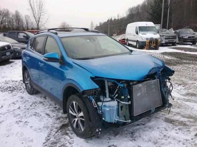 JTMRFREV7HJ714275 - 2017 TOYOTA RAV4 XLE BLUE photo 1