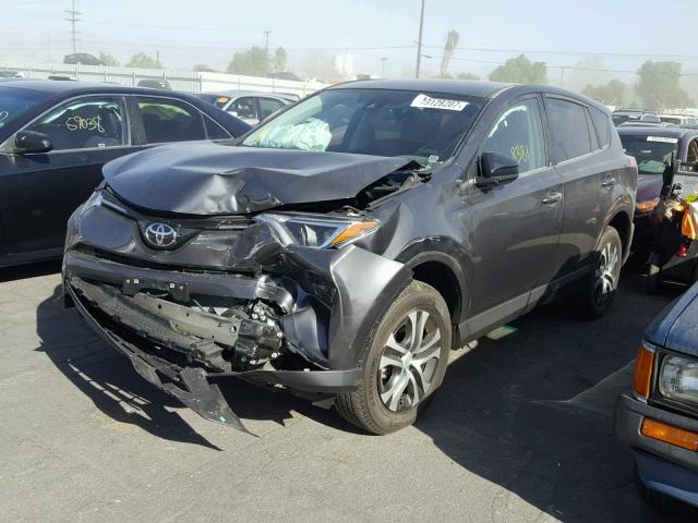 2T3ZFREV4HW390056 - 2017 TOYOTA RAV4 LE GRAY photo 2