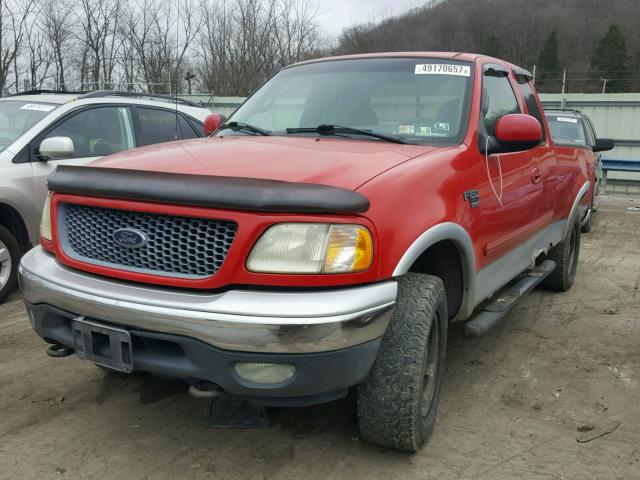 1FTRX18L8YNA10779 - 2000 FORD F150 RED photo 2