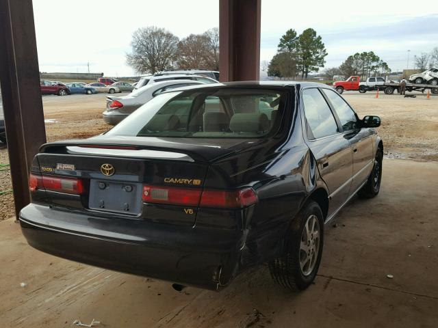 JT2BF28K4X0157106 - 1999 TOYOTA CAMRY LE BLACK photo 4