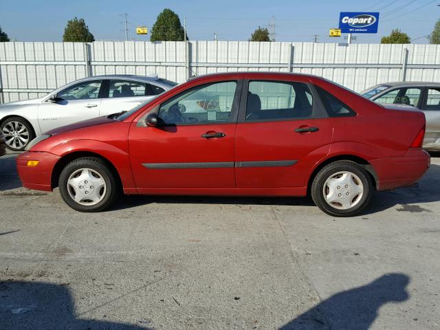 1FAFP33ZX3W209870 - 2003 FORD FOCUS LX RED photo 9