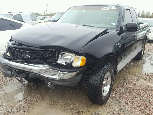 1FTRX17W62KA55952 - 2002 FORD F150 BLACK photo 2